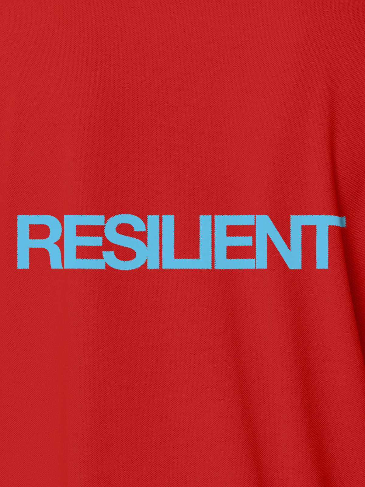 Close up of 'Resilient' design on Men's Red Polo T-shirt, highlighting intricate details and vibrant print.