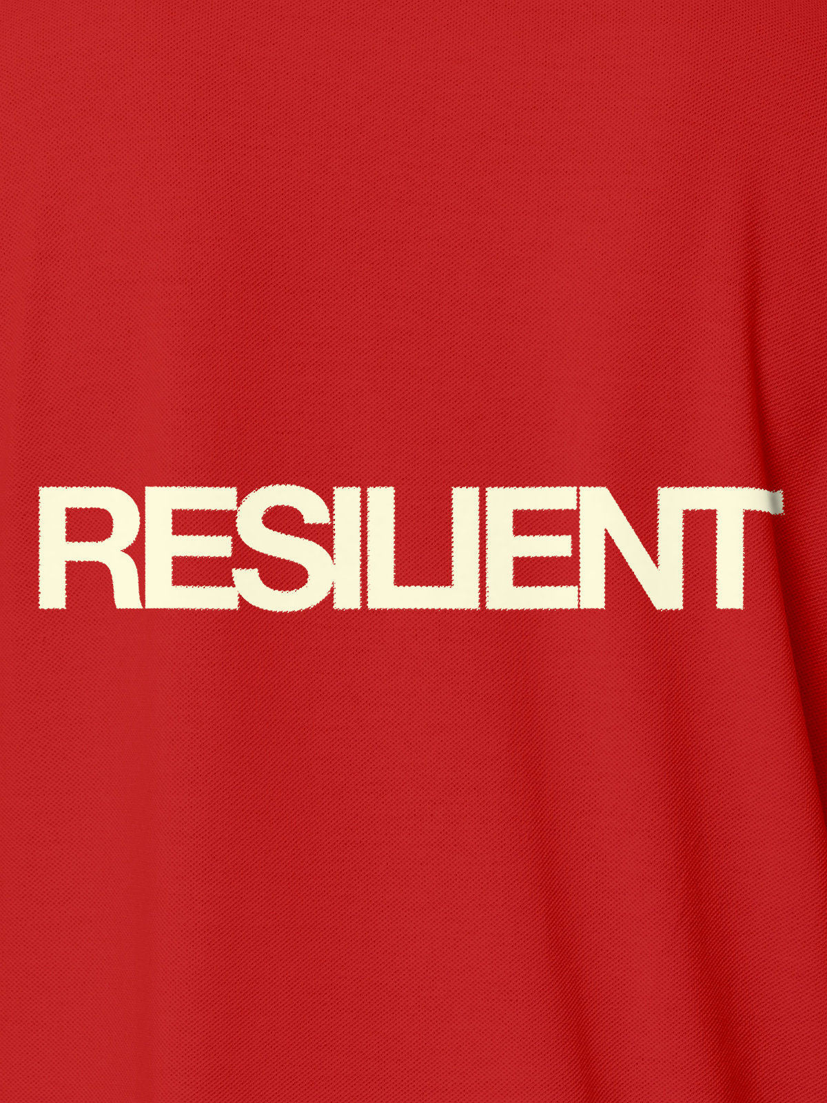 Close up of 'Resilient' design on Men's Red Polo T-shirt, highlighting intricate details and vibrant print.