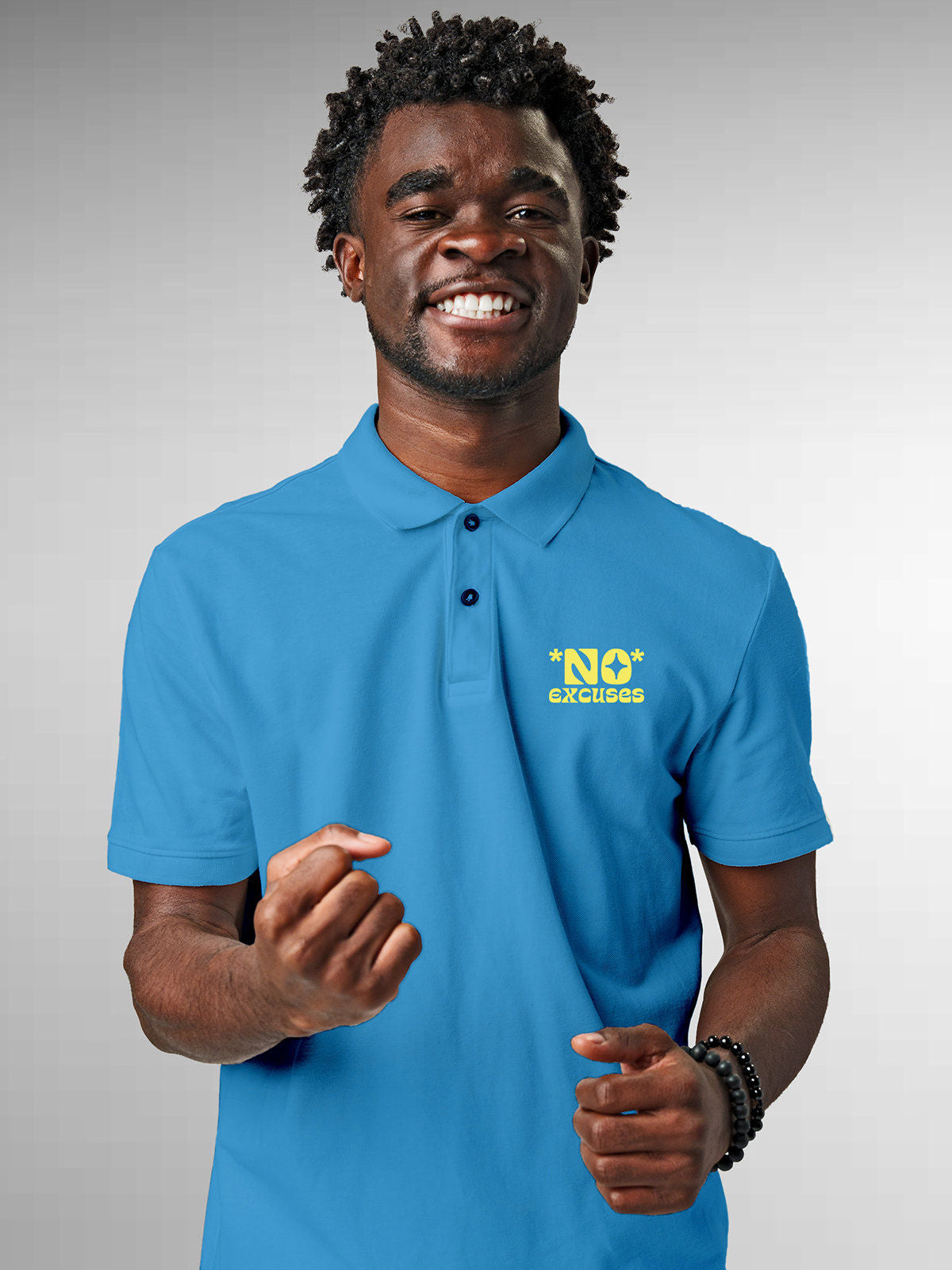 Model wearing Men's Blue Polo T-shirt with 'No Excuses' design, offering effortless style and premium comfort