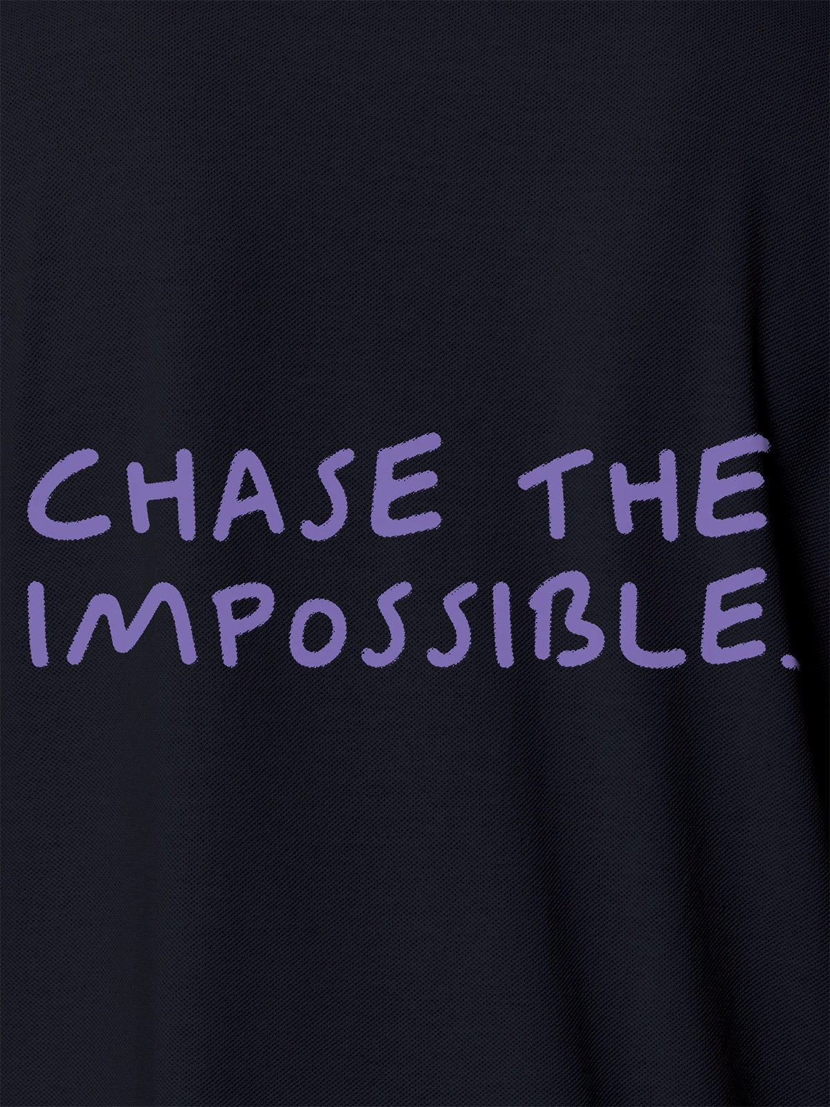 Close up of 'Chase The Impossible' design on Men's Navy Blue Polo T-shirt, highlighting intricate details and vibrant print.