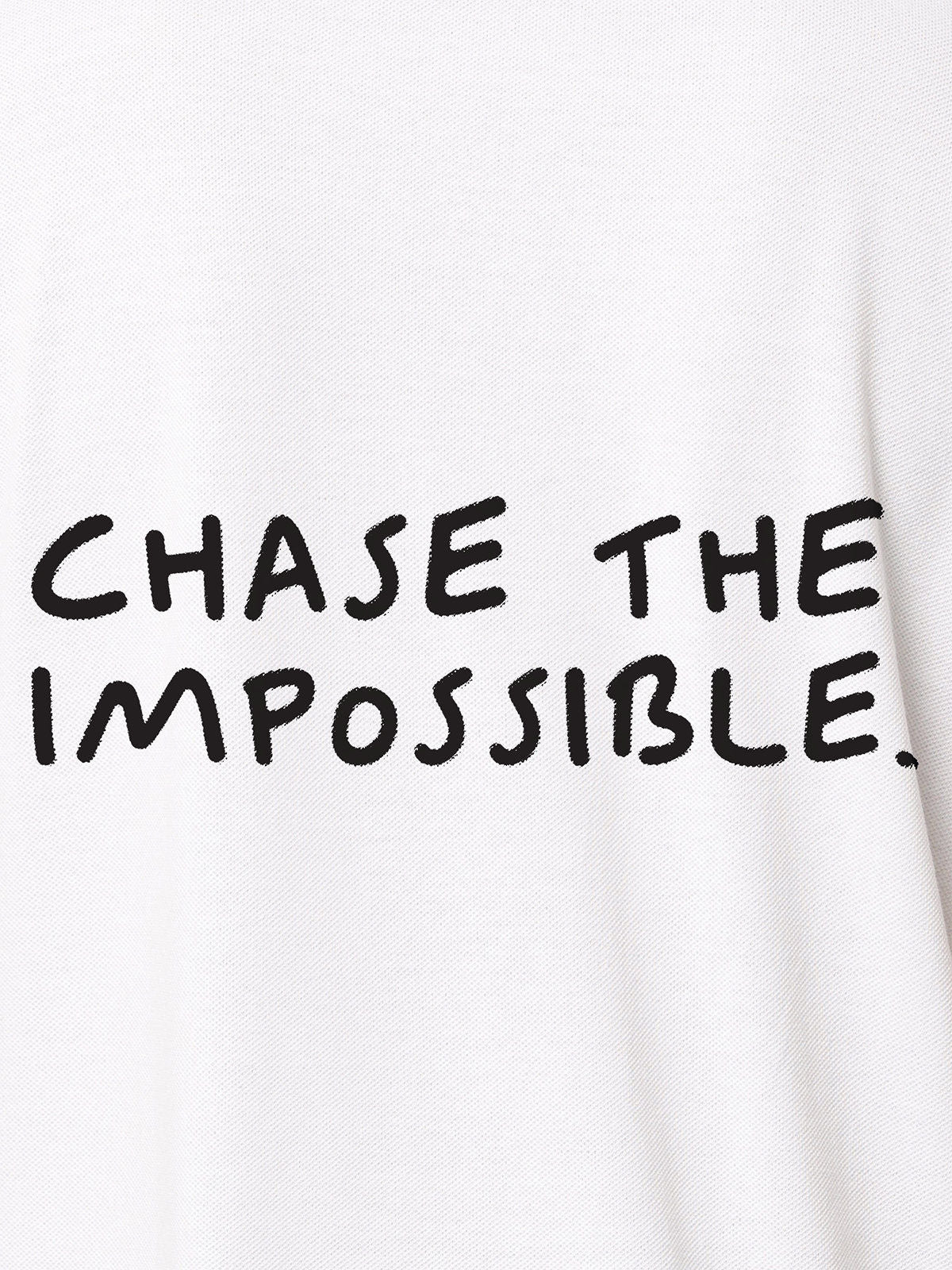 Close up of 'Chase The Impossible' design on Men's White Polo T-shirt, highlighting intricate details and vibrant print.