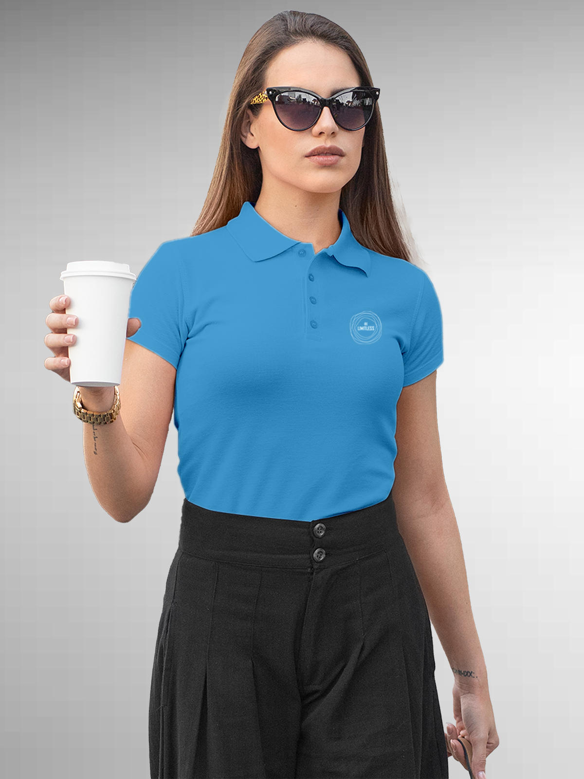 Model wearing Women's Blue Polo T-shirt with 'Be Limitless' design, offering effortless style and premium comfort