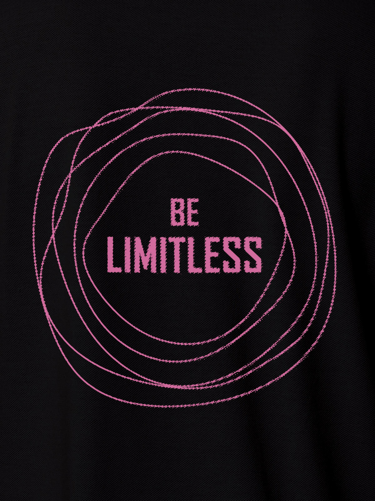 Close up of 'Be Limitless' design on Men's Black Polo T-shirt, highlighting intricate details and vibrant print.