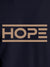 Close up of 'Hope' design on Women's Navy Blue Round Neck T-shirt, highlighting intricate details and vibrant print.