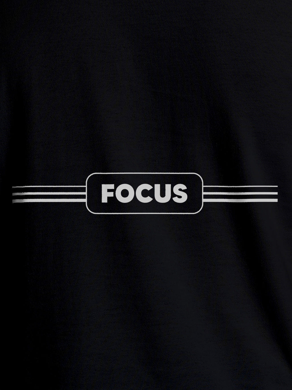 Close up of 'Focus' design on Women's Black Round Neck T-shirt, highlighting intricate details and vibrant print.