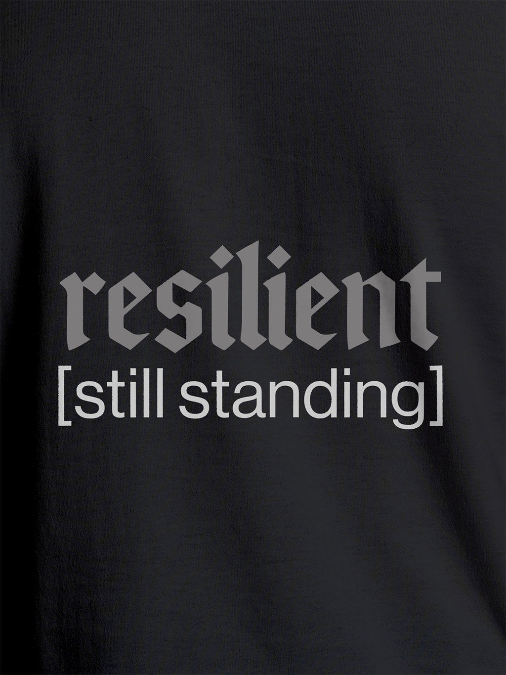 Close up of 'Resilient' design on Women's Dark Grey Round Neck T-shirt, highlighting intricate details and vibrant print.