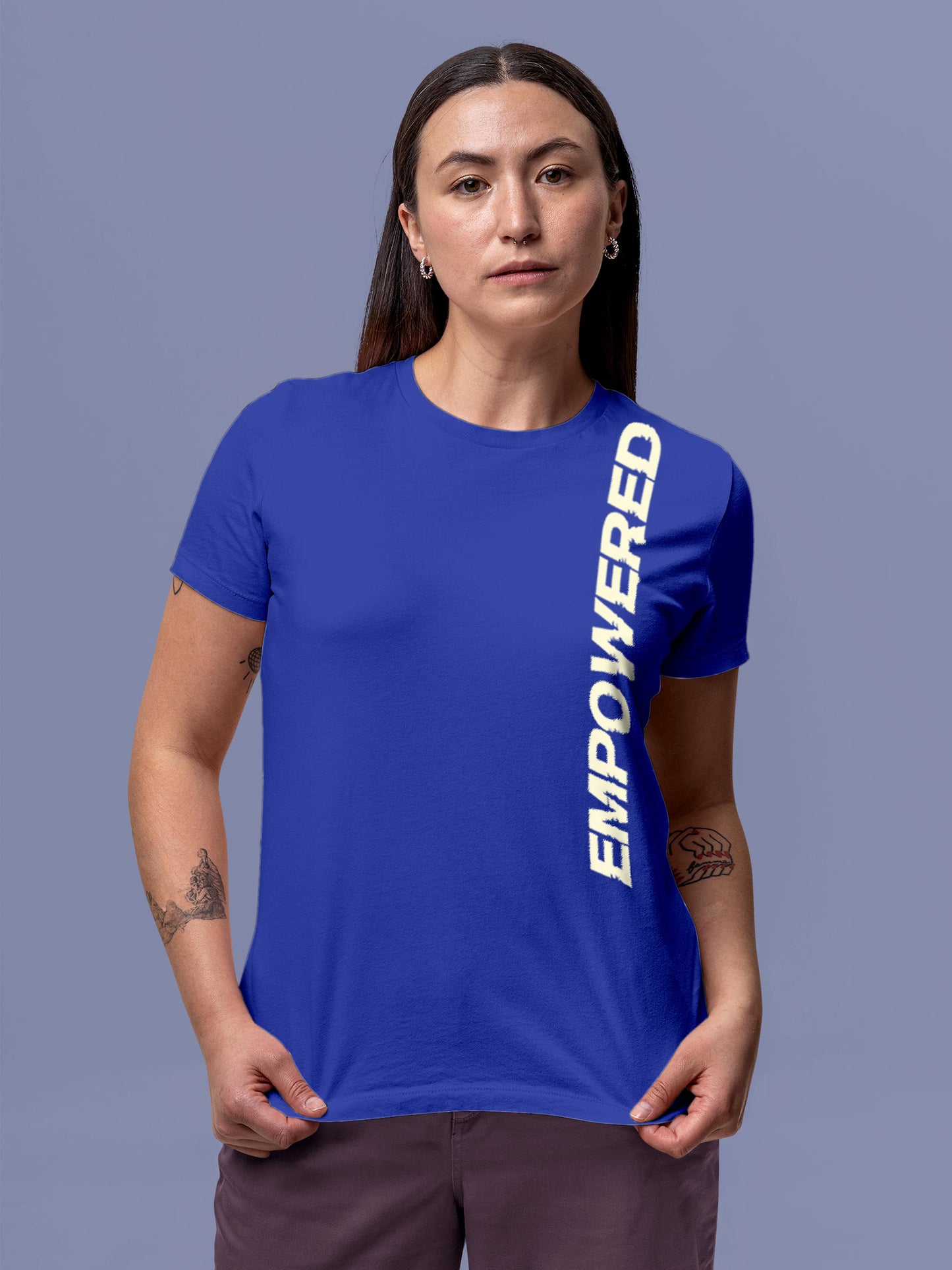 Model wearing Women's Blue Round Neck T-shirt with 'Empowered' design, offering effortless style and premium comfort