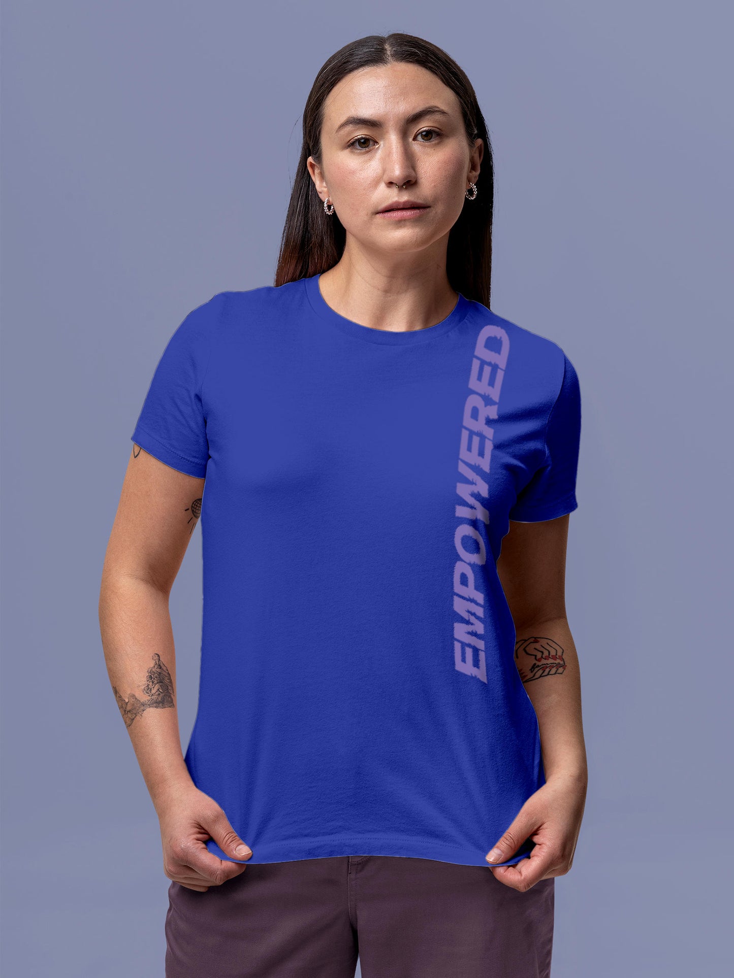 Model wearing Women's Blue Round Neck T-shirt with 'Empowered' design, offering effortless style and premium comfort