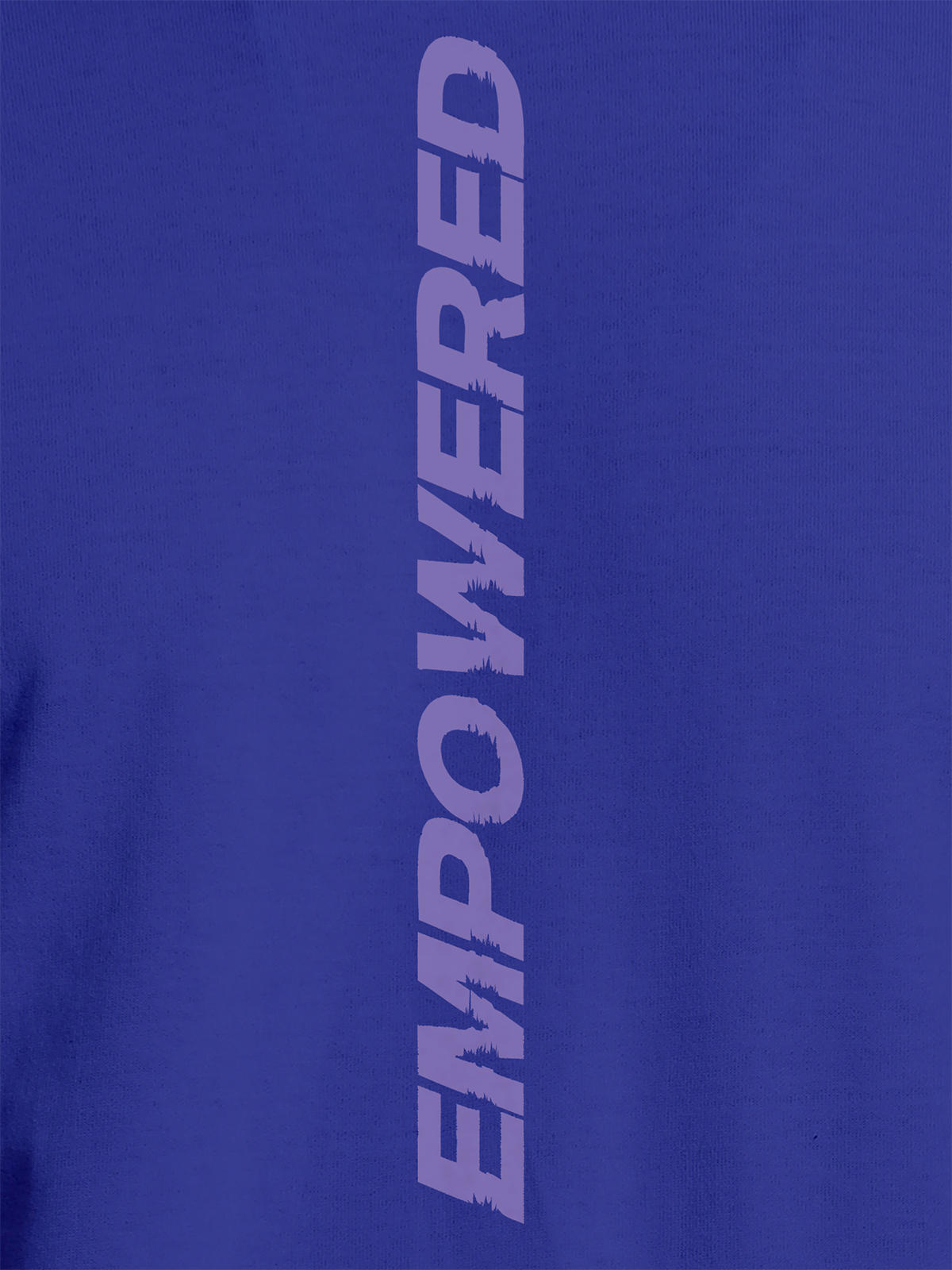 Close up of 'Empowered' design on Women's Blue Round Neck T-shirt, highlighting intricate details and vibrant print.