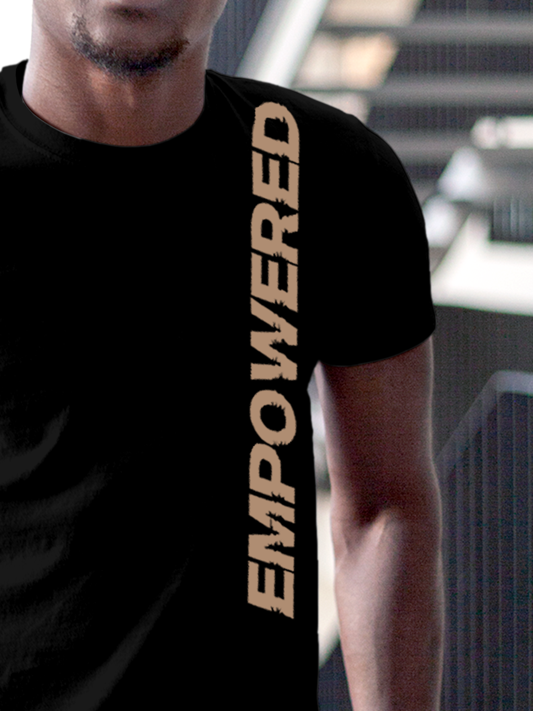 Close up of 'Empowered' design on Men's Black Round Neck T-shirt, highlighting intricate details and vibrant print.