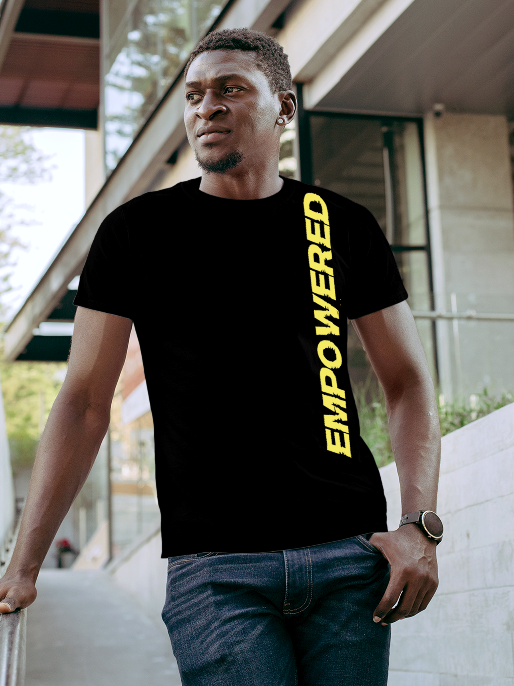 Model wearing Men's Black Round Neck T-shirt with 'Empowered' design, offering effortless style and premium comfort
