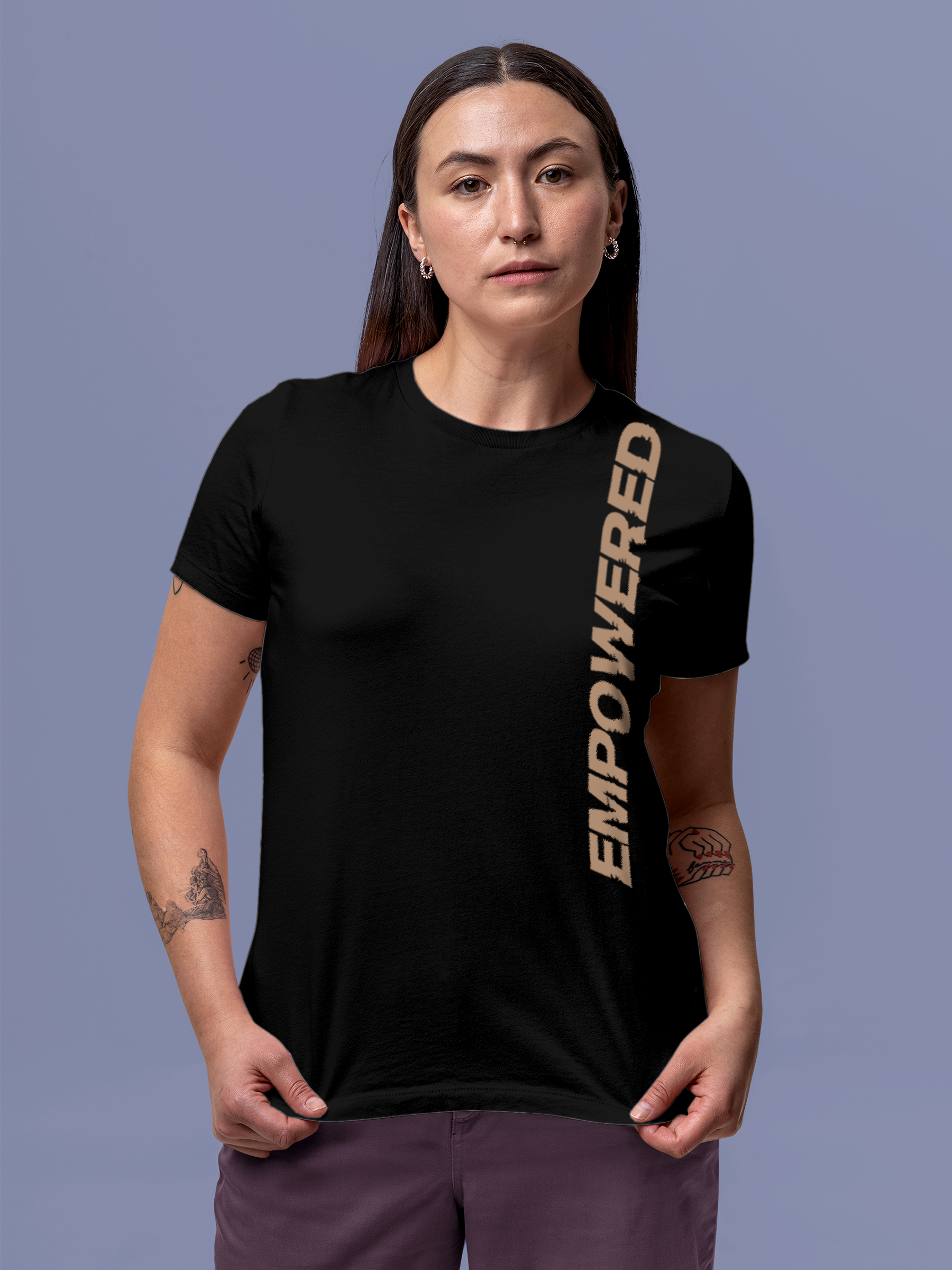 Model wearing Women's Black Round Neck T-shirt with 'Empowered' design, offering effortless style and premium comfort