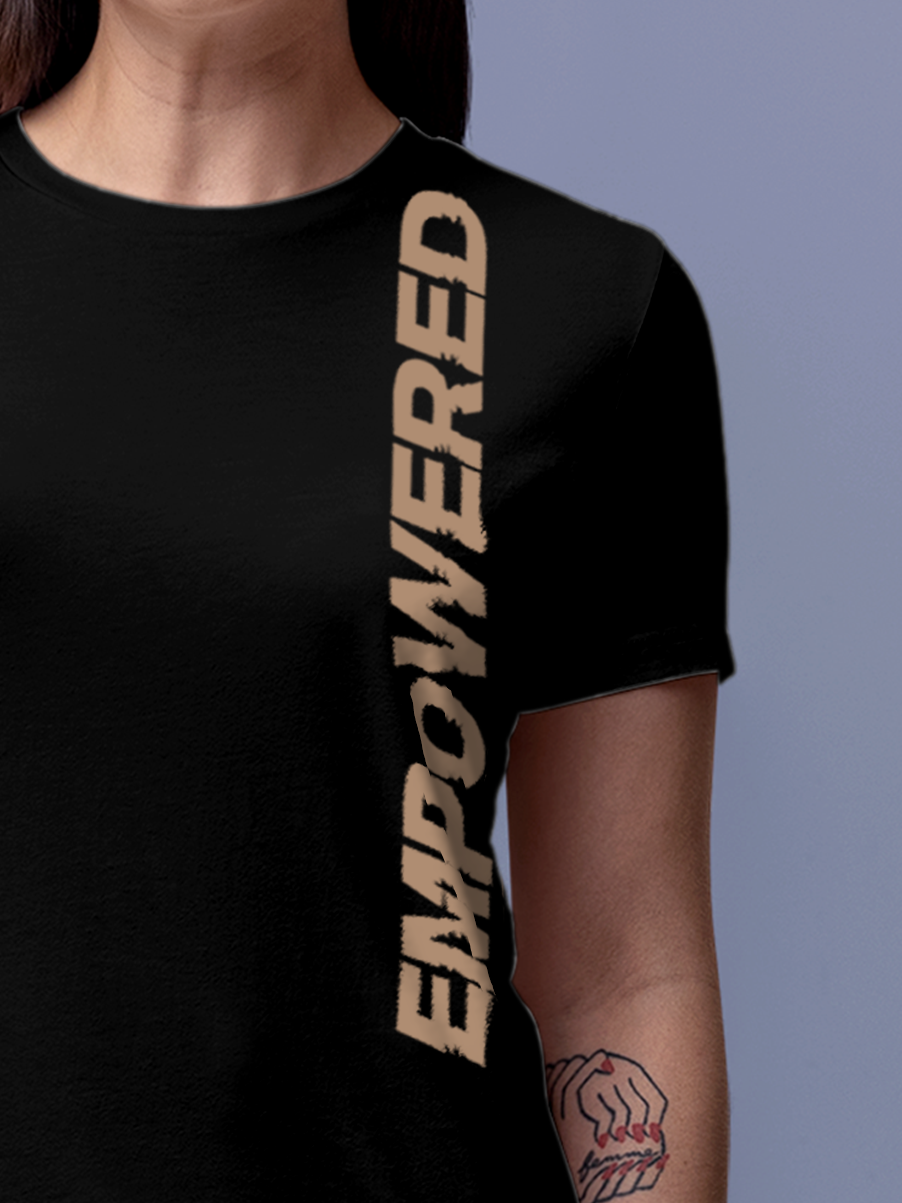 Close up of 'Empowered' design on Women's Black Round Neck T-shirt, highlighting intricate details and vibrant print.