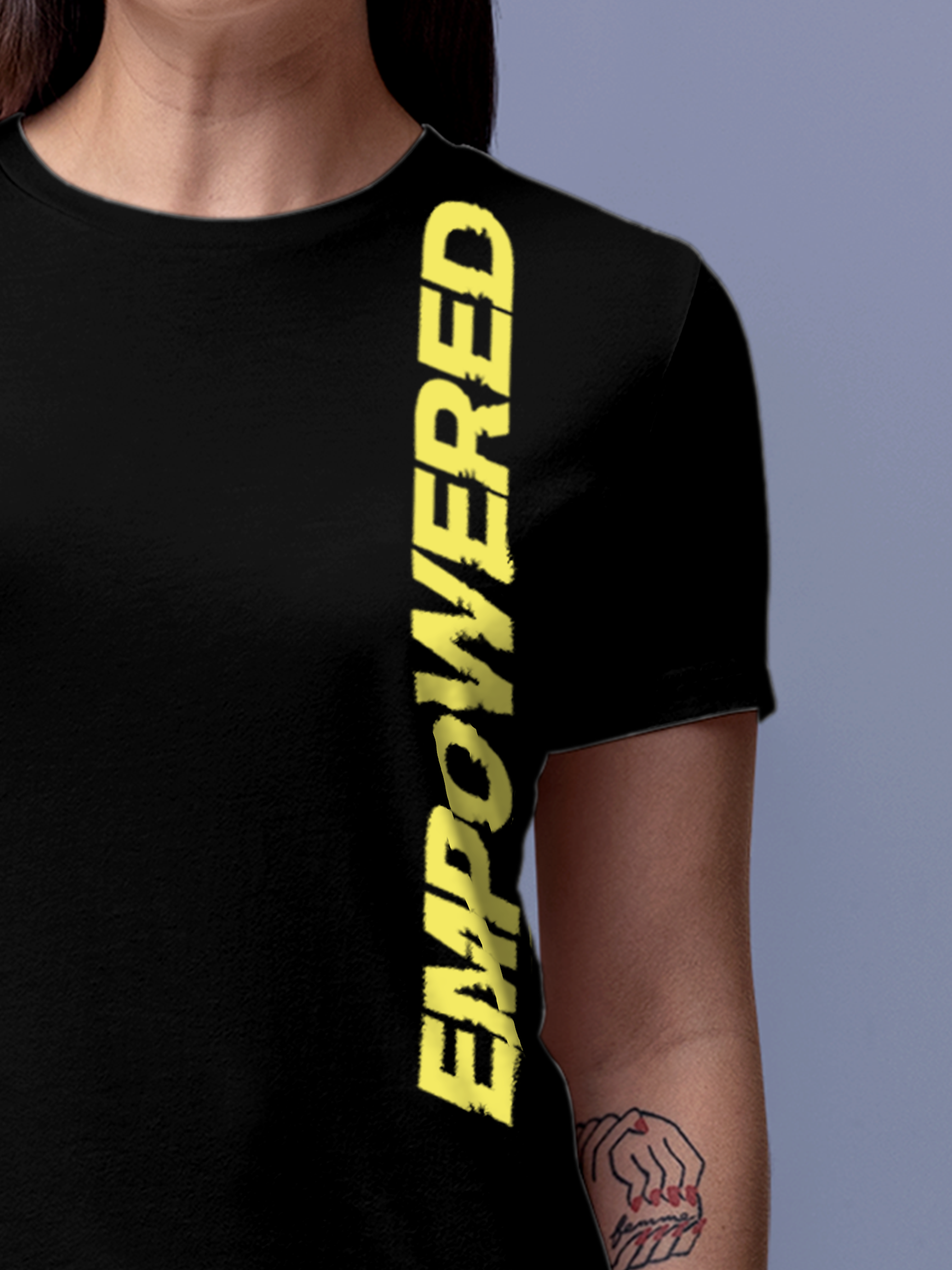 Close up of 'Empowered' design on Women's Black Round Neck T-shirt, highlighting intricate details and vibrant print.
