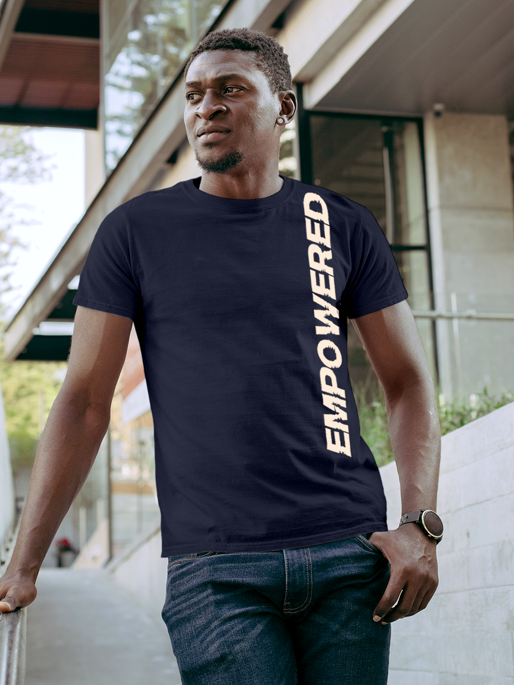 Model wearing Men's Navy Blue Round Neck T-shirt with 'Empowered' design, offering effortless style and premium comfort