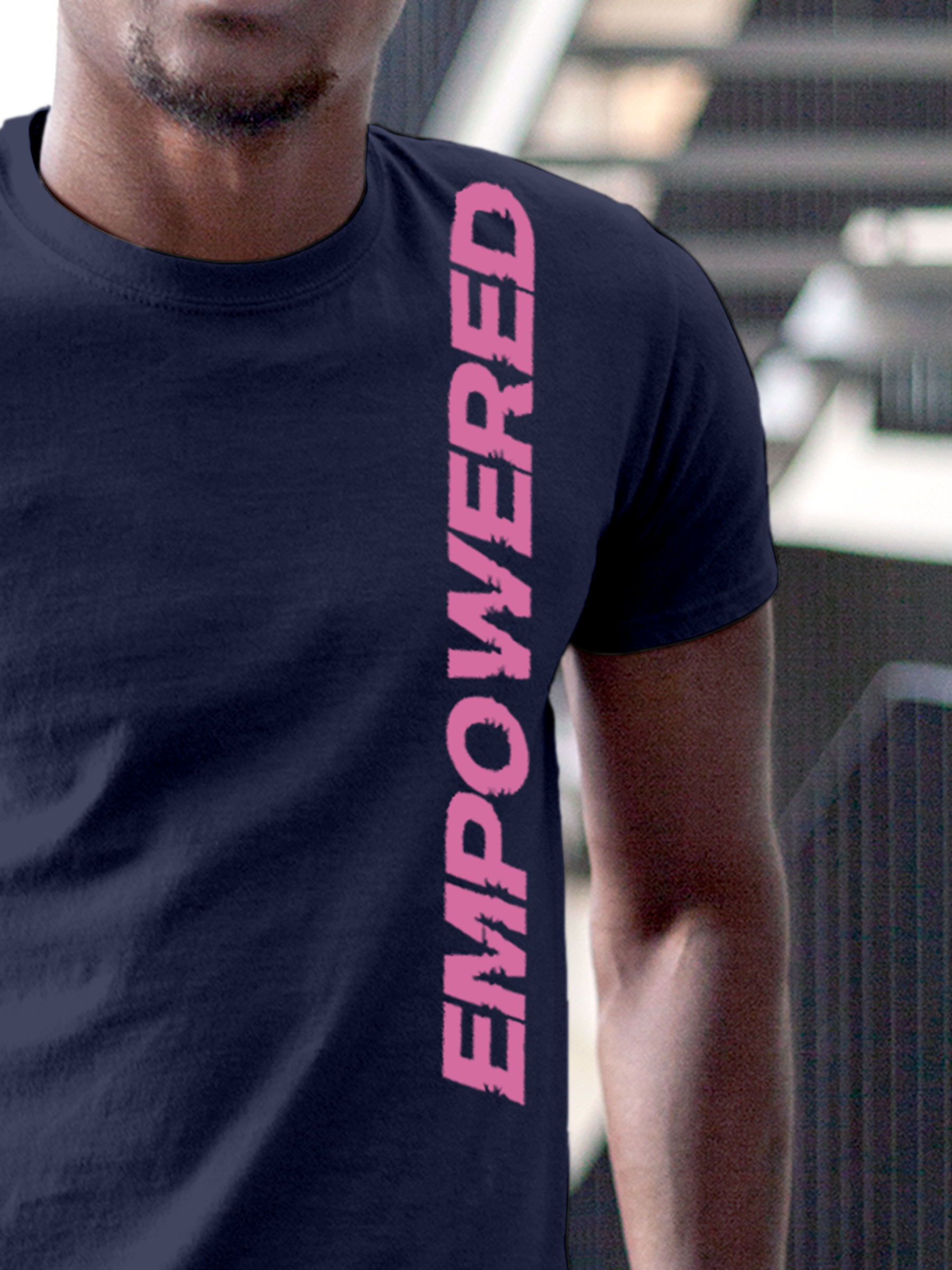 Close up of 'Empowered' design on Men's Navy Blue Round Neck T-shirt, highlighting intricate details and vibrant print.