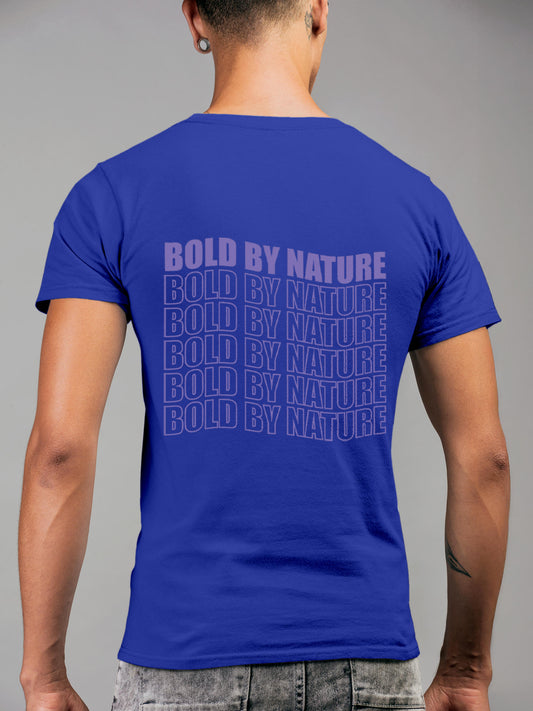 Model wearing Men's Blue Round Neck T-shirt with 'Bold By Nature' design, offering effortless style and premium comfort