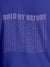 Close up of 'Bold By Nature' design on Men's Blue Round Neck T-shirt, highlighting intricate details and vibrant print.