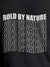 Close up of 'Bold By Nature' design on Men's Dark Grey Round Neck T-shirt, highlighting intricate details and vibrant print.