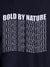 Close up of 'Bold By Nature' design on Women's Navy Blue Round Neck T-shirt, highlighting intricate details and vibrant print.