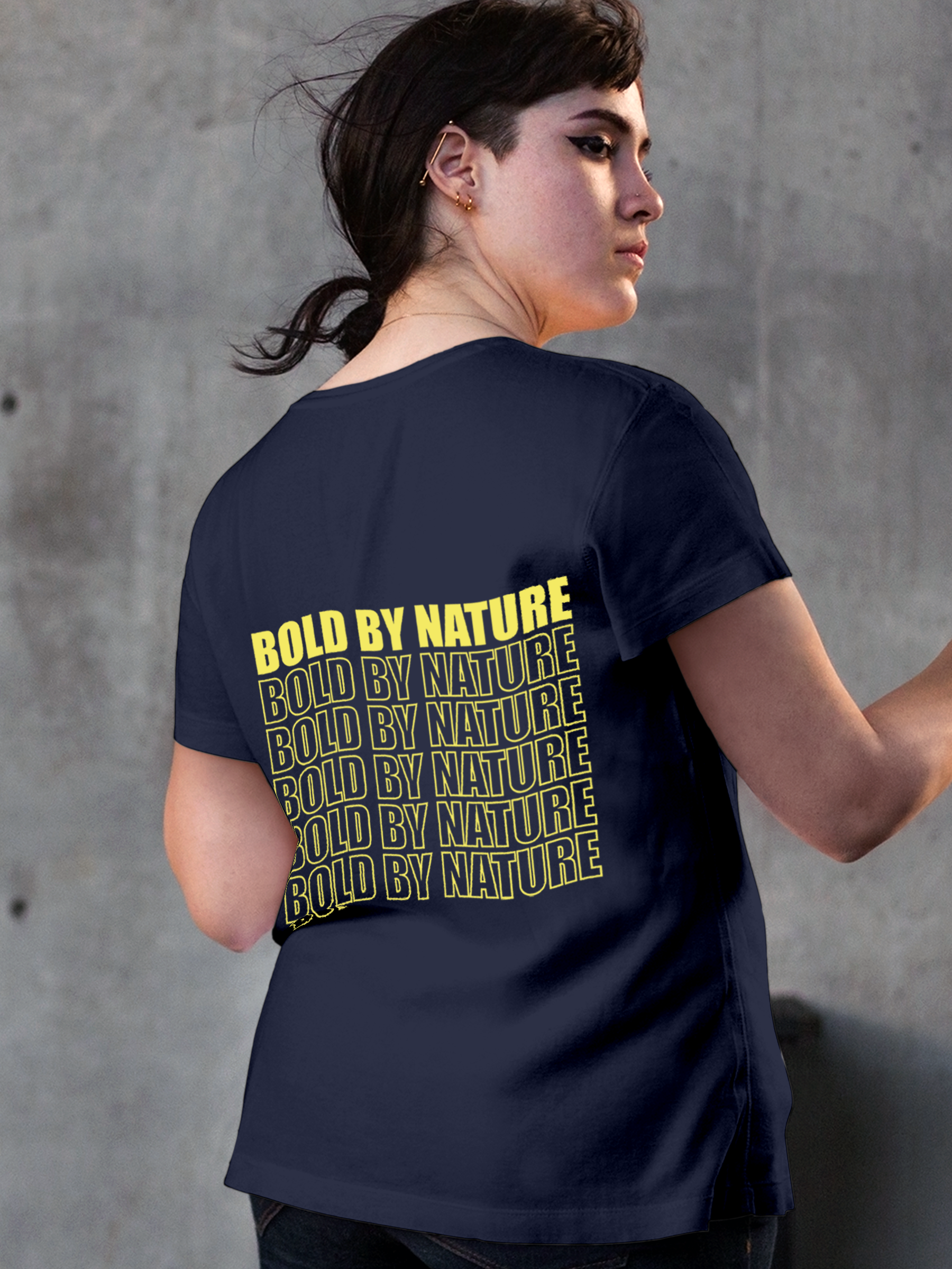 Model wearing Women's Navy Blue Round Neck T-shirt with 'Bold By Nature' design, offering effortless style and premium comfort