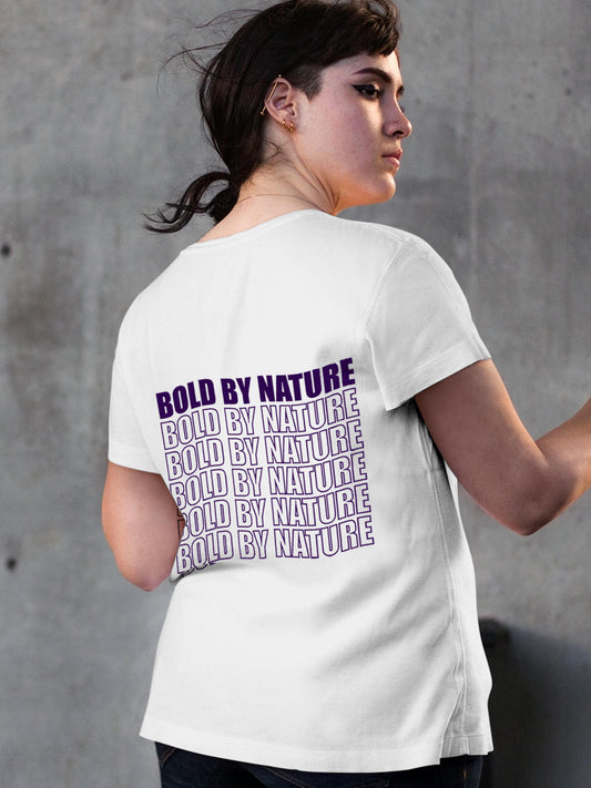 Model wearing Women's White Round Neck T-shirt with 'Bold By Nature' design, offering effortless style and premium comfort