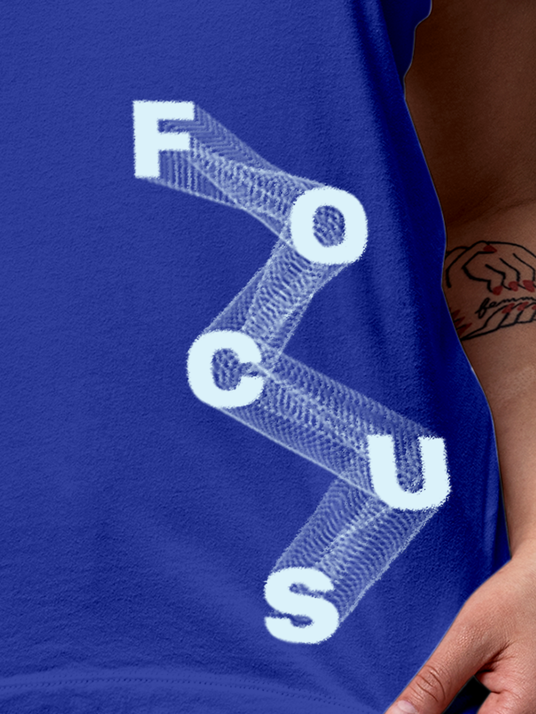 Close up of 'Focus' design on Women's Blue Round Neck T-shirt, highlighting intricate details and vibrant print.