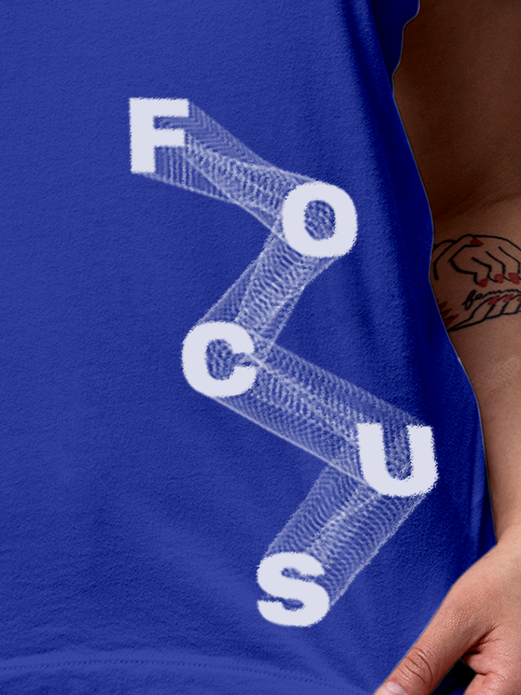 Close up of 'Focus' design on Women's Blue Round Neck T-shirt, highlighting intricate details and vibrant print.