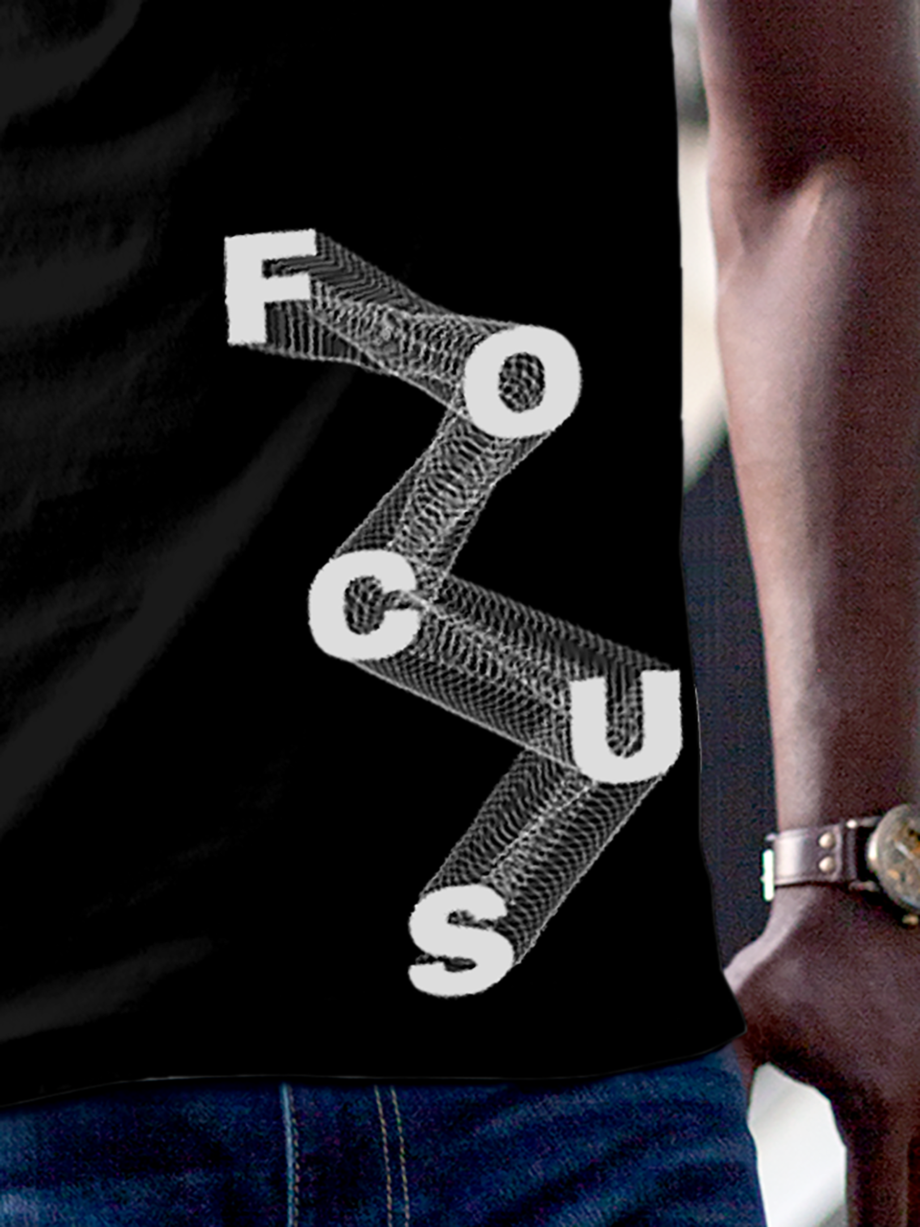 Close up of 'Focus' design on Men's Black Round Neck T-shirt, highlighting intricate details and vibrant print.