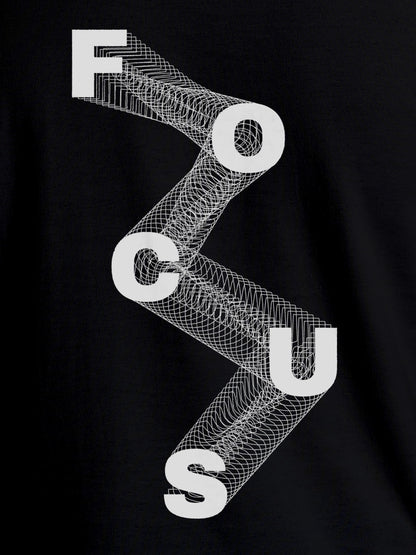 Close up of 'Focus' design on Women's Black Round Neck T-shirt, highlighting intricate details and vibrant print.