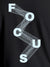 Close up of 'Focus' design on Women's Dark Grey Round Neck T-shirt, highlighting intricate details and vibrant print.