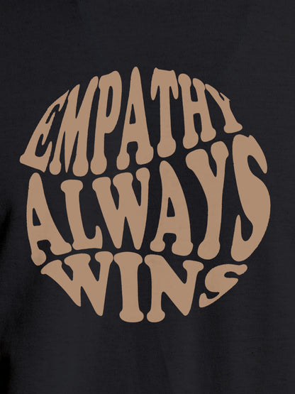 Close up of 'Empathy Always Wins' design on Women's Dark Grey Round Neck T-shirt, highlighting intricate details and vibrant print.