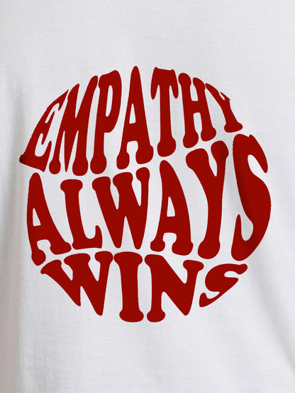 Close up of 'Empathy Always Wins' design on Men's White Round Neck T-shirt, highlighting intricate details and vibrant print.