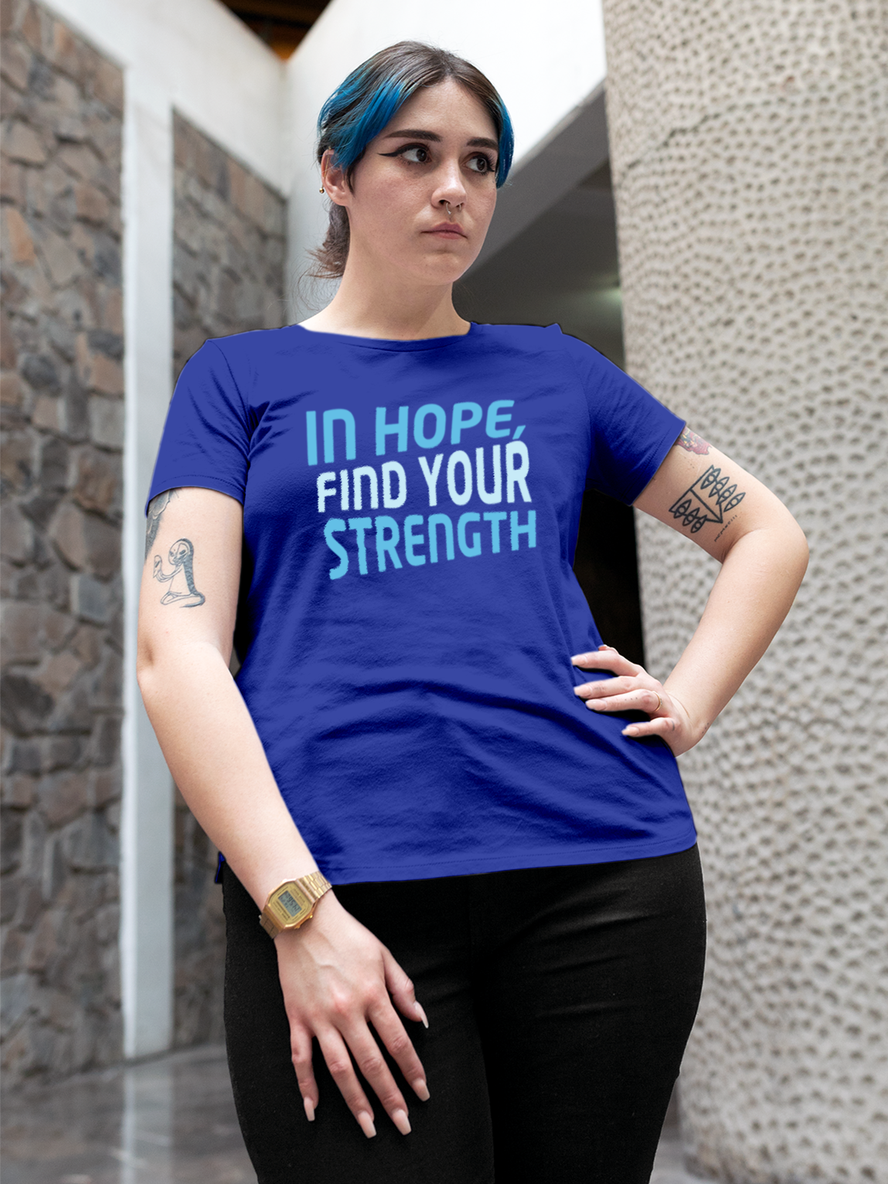 Model wearing Women's Blue Round Neck T-shirt with 'In Hope, Find Your Strength' design, offering effortless style and premium comfort
