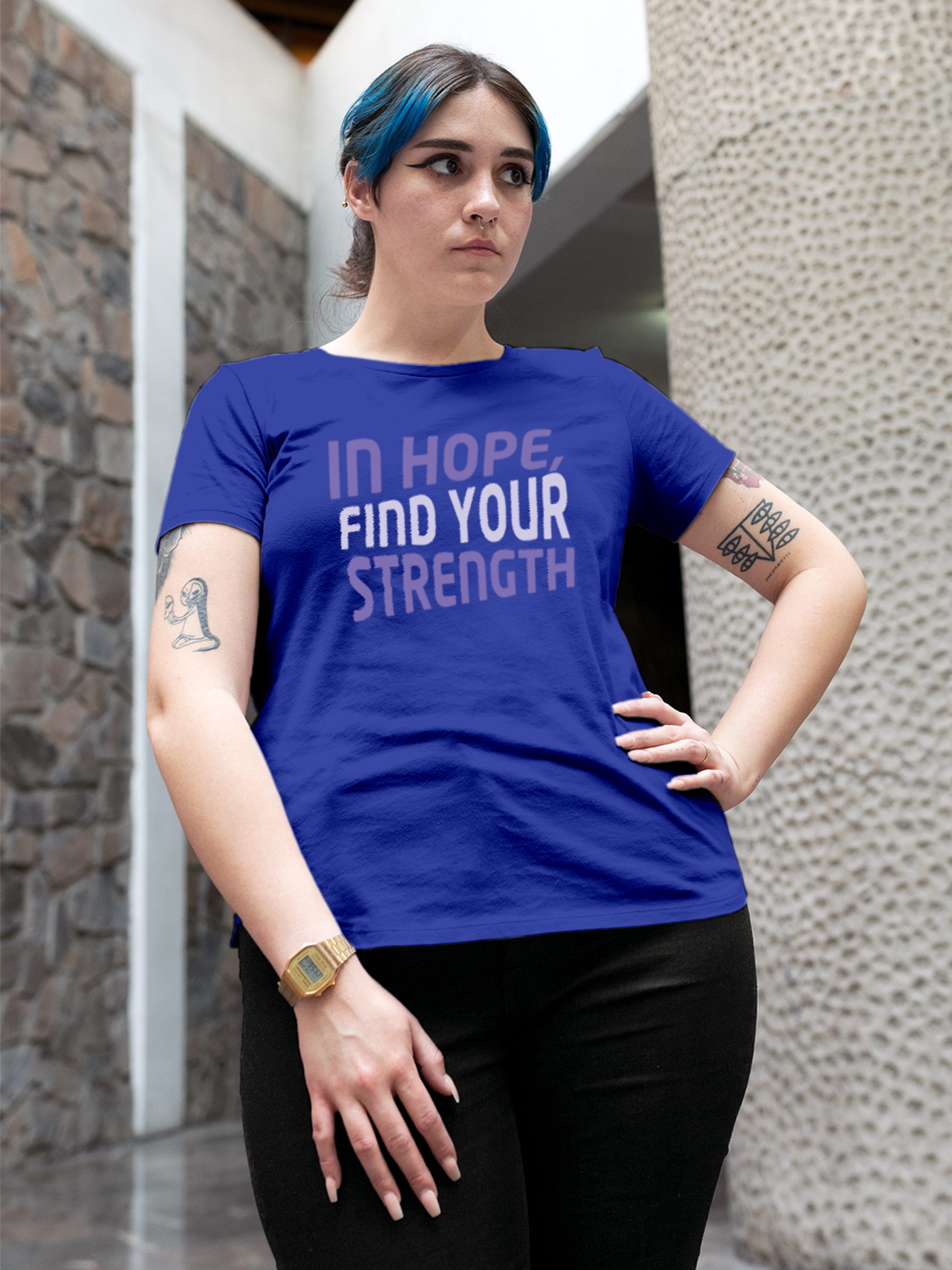 Fighterhero T-shirts: Model wearing Women's Blue Round Neck T-shirt with 'In Hope, Find Your Strength' design