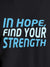 Close up of 'In Hope, Find Your Strength' design on Men's Dark Grey Round Neck T-shirt, highlighting intricate details and vibrant print.