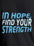 Close up of 'In Hope, Find Your Strength' design on Women's Dark Grey Round Neck T-shirt, highlighting intricate details and vibrant print.