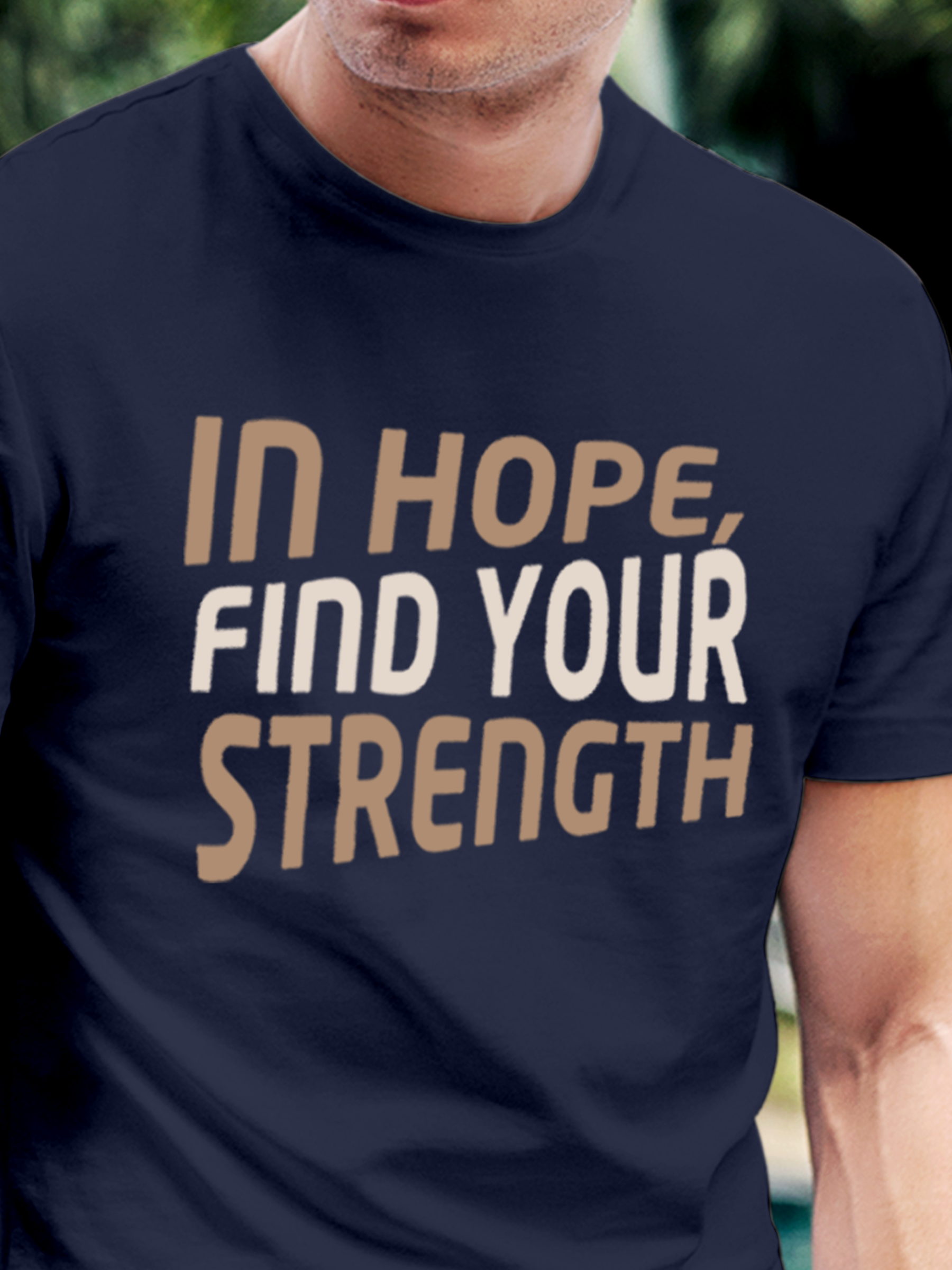 Close up of 'In Hope, Find Your Strength' design on Men's Navy Blue Round Neck T-shirt, highlighting intricate details and vibrant print.