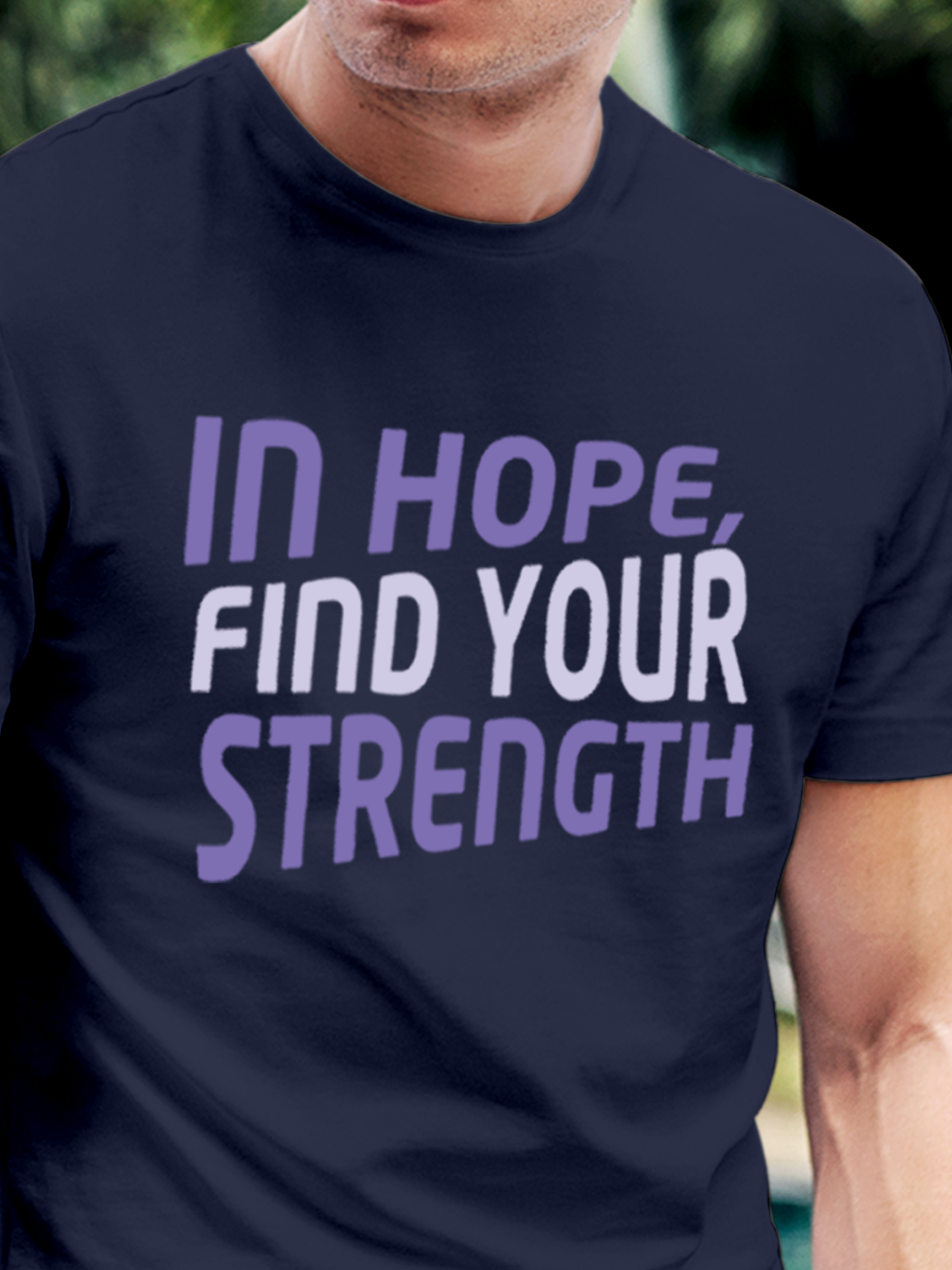 Close up of 'In Hope, Find Your Strength' design on Men's Navy Blue Round Neck T-shirt, highlighting intricate details and vibrant print.