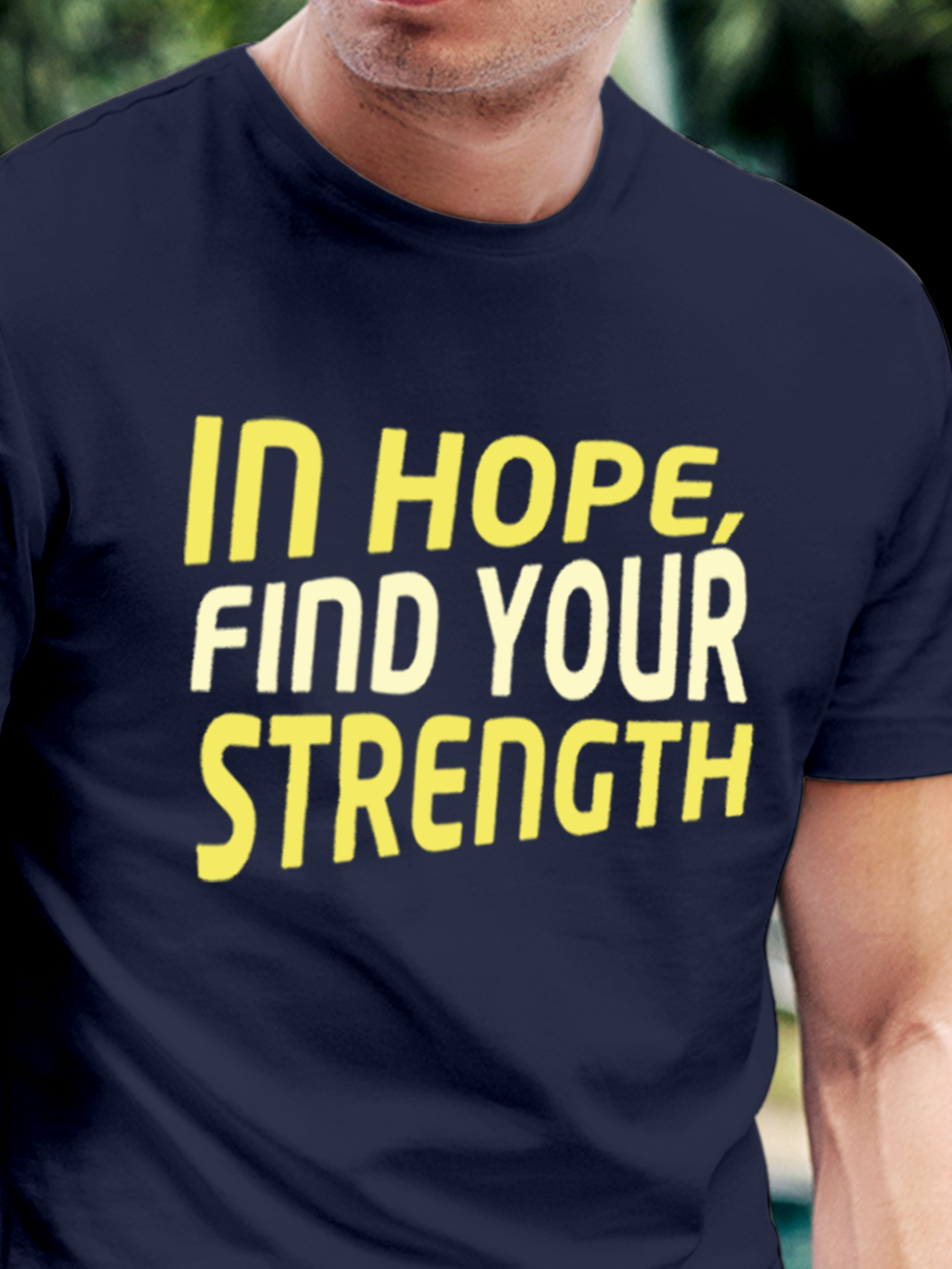 Close up of 'In Hope, Find Your Strength' design on Men's Navy Blue Round Neck T-shirt, highlighting intricate details and vibrant print.