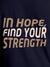 Close up of 'In Hope, Find Your Strength' design on Women's Navy Blue Round Neck T-shirt, highlighting intricate details and vibrant print.