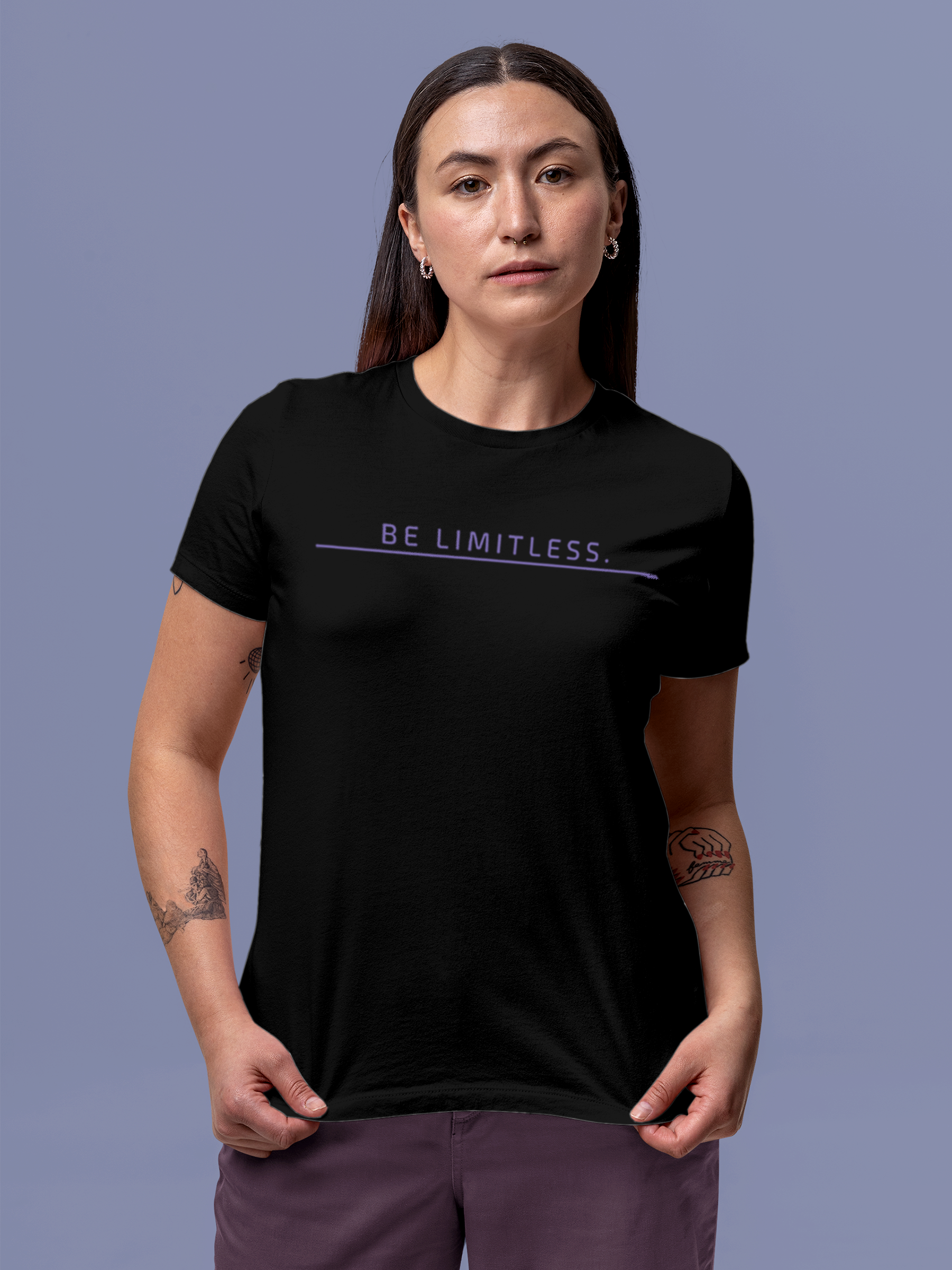 Model wearing Women's Black Round Neck T-shirt with 'Be Limitless' design, offering effortless style and premium comfort