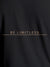 Close up of 'Be Limitless' design on Men's Dark Grey Round Neck T-shirt, highlighting intricate details and vibrant print.