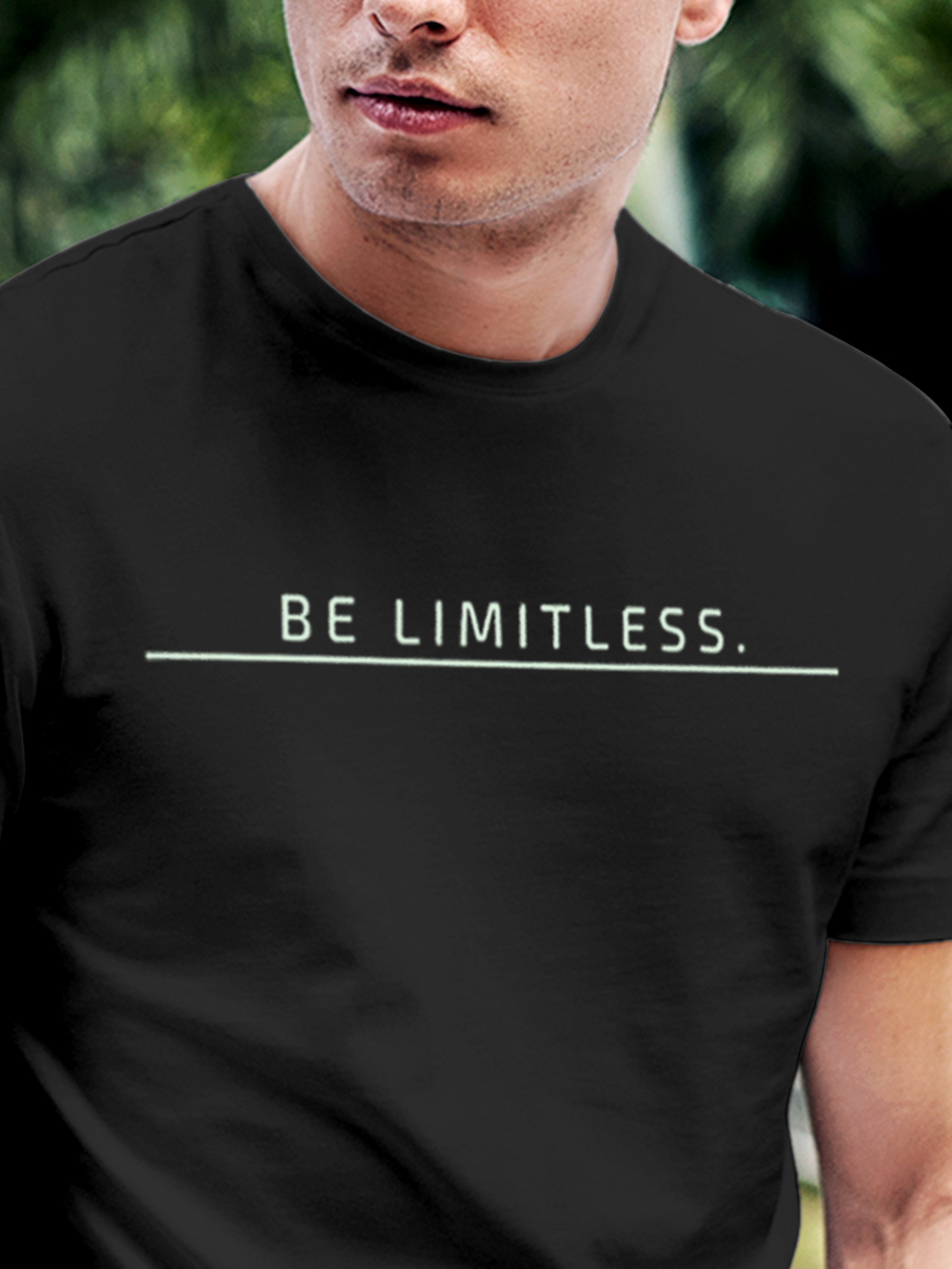 Close up of 'Be Limitless' design on Men's Dark Grey Round Neck T-shirt, highlighting intricate details and vibrant print.
