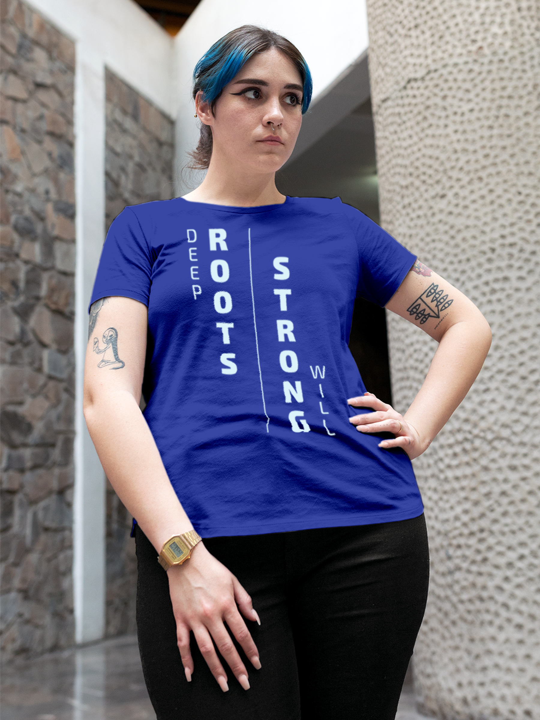 Model wearing Women's Blue Round Neck T-shirt with 'Deep Roots Strong Will' design, offering effortless style and premium comfort