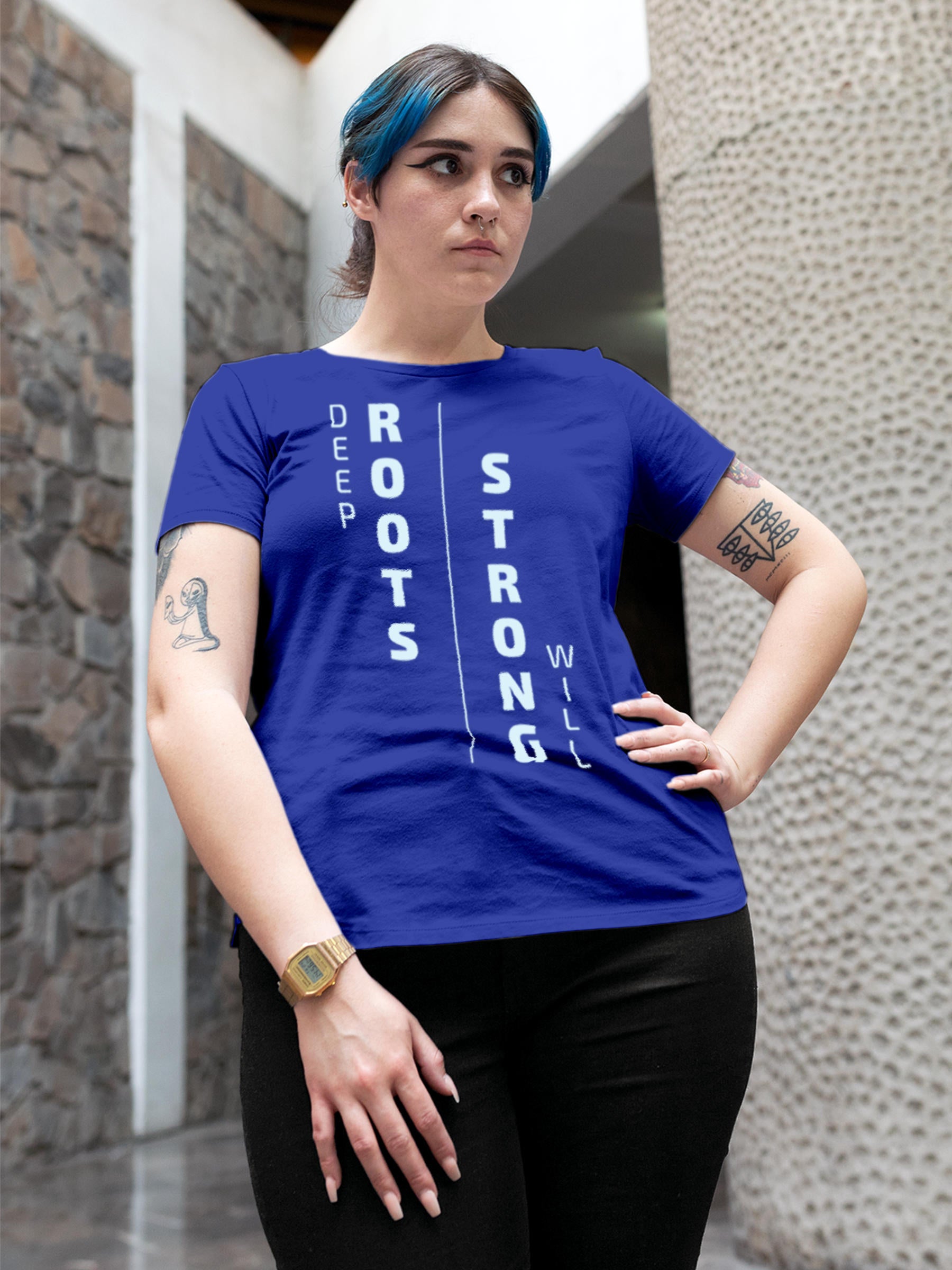 Model wearing Women's Blue Round Neck T-shirt with 'Deep Roots Strong Will' design, offering effortless style and premium comfort
