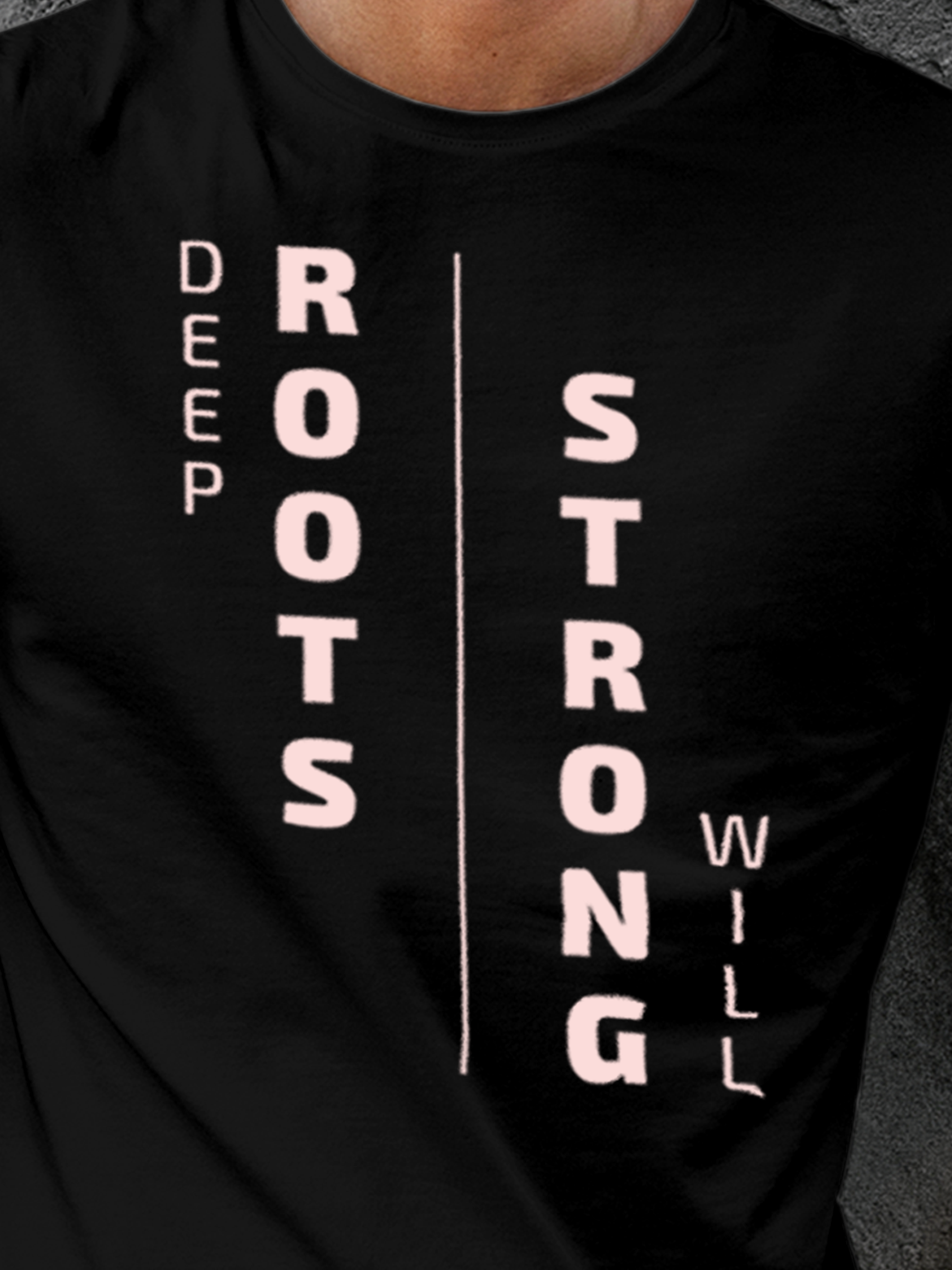 Close up of 'Deep Roots Strong Will' design on Men's Black Round Neck T-shirt, highlighting intricate details and vibrant print.
