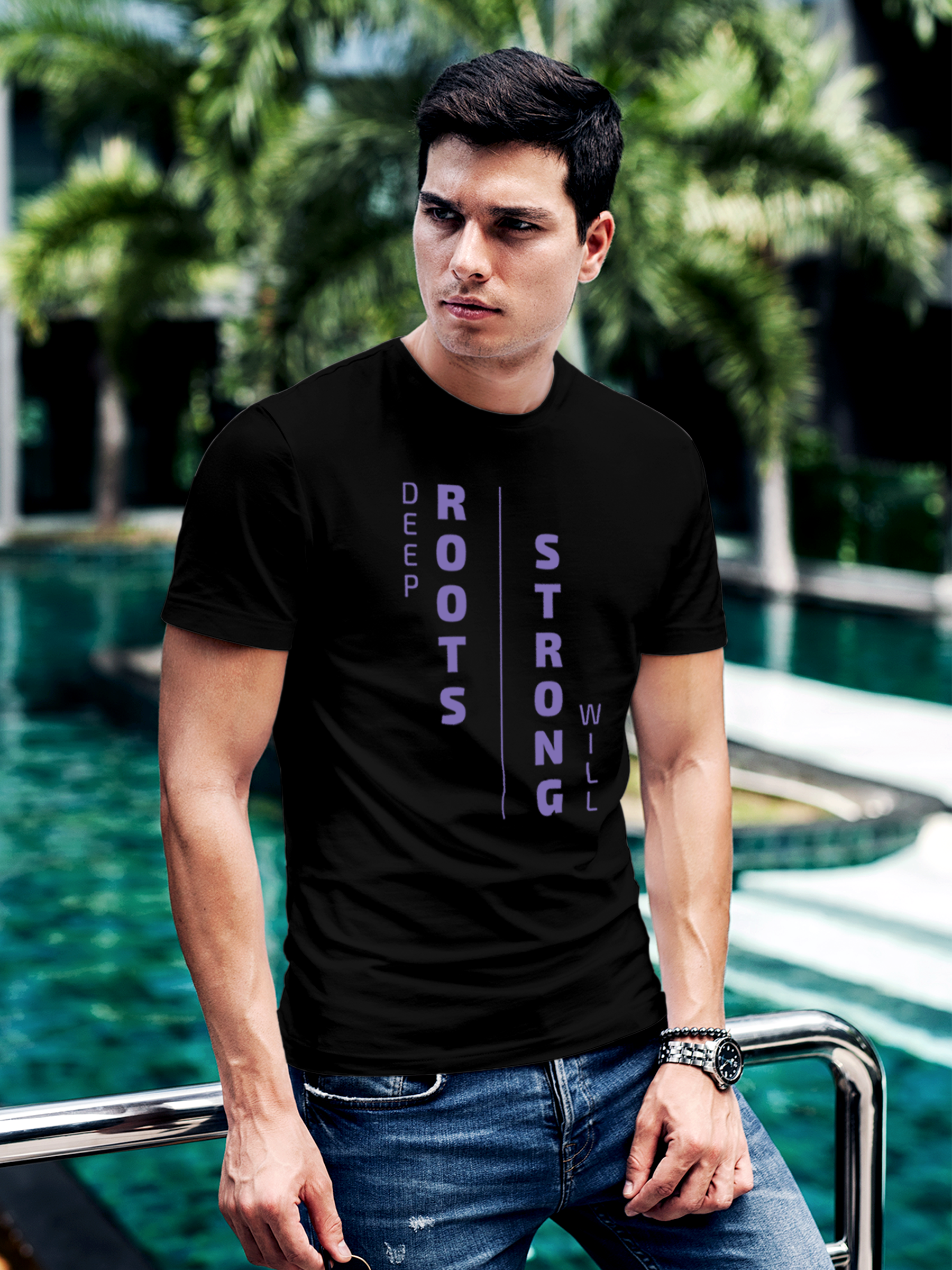 Model wearing Men's Black Round Neck T-shirt with 'Deep Roots Strong Will' design, offering effortless style and premium comfort