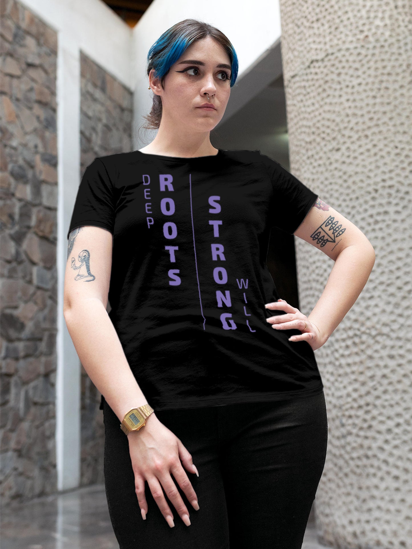 Model wearing Women's Black Round Neck T-shirt with 'Deep Roots Strong Will' design, offering effortless style and premium comfort