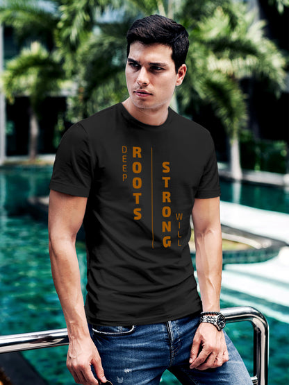 Model wearing Men's Dark Grey Round Neck T-shirt with 'Deep Roots Strong Will' design, offering effortless style and premium comfort